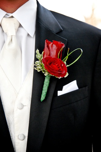 Enchanted Florist Red Boutonniere Close Up